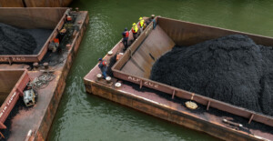 coal barges being tied together drone aerial photograph