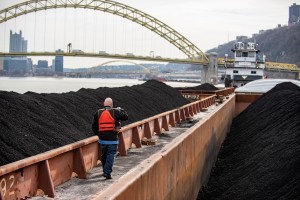 commercial photo of tug boat deckhand working in Pittsburgh